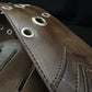 Aged strap metal eyelets - GBS