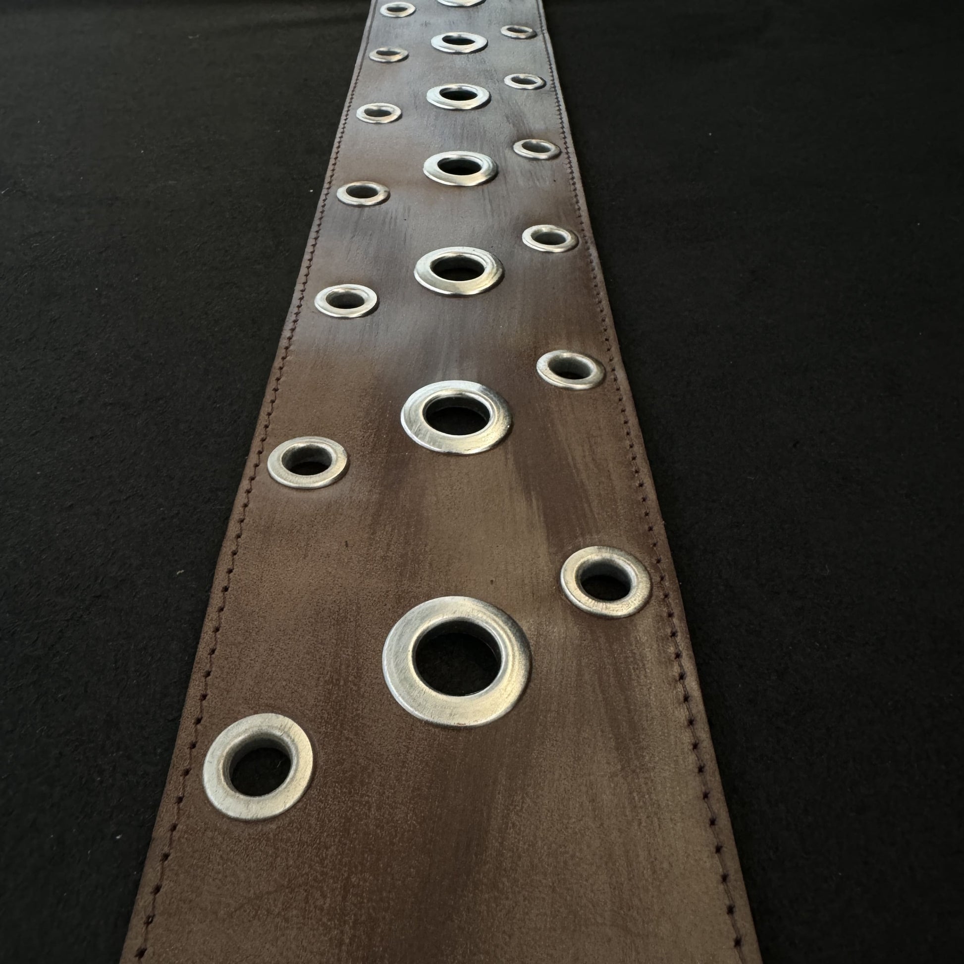 Aged strap metal eyelets - GBS